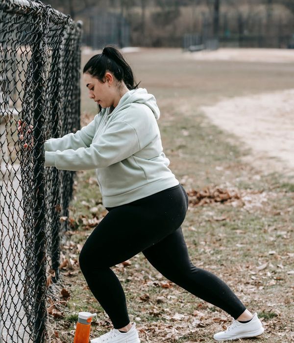 Woman feeling energetic and full of vitality outdoors.